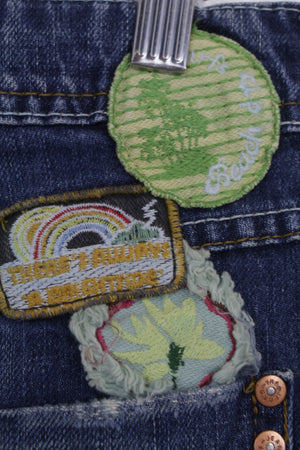 Ανοιχτόχρωμη τζην μίνι φούστα με patches 