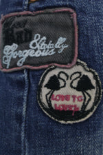 Ανοιχτόχρωμη τζην μίνι φούστα με patches 